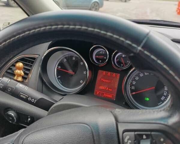 Серый Опель Астра, объемом двигателя 2 л и пробегом 230 тыс. км за 7200 $, фото 1 на Automoto.ua