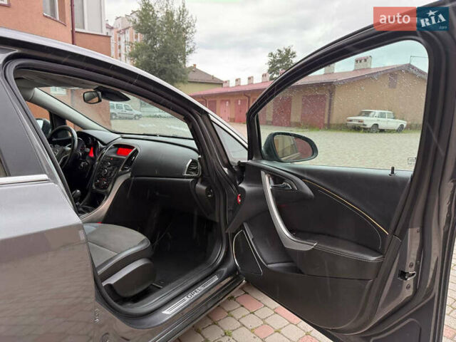 Серый Опель Астра, объемом двигателя 1.4 л и пробегом 184 тыс. км за 5999 $, фото 59 на Automoto.ua
