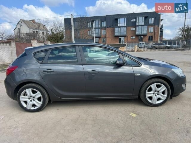 Серый Опель Астра, объемом двигателя 1.4 л и пробегом 212 тыс. км за 6400 $, фото 17 на Automoto.ua