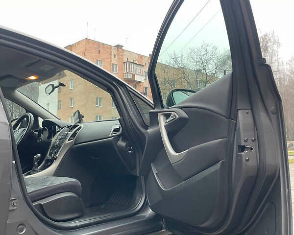 Сірий Опель Астра, об'ємом двигуна 1.4 л та пробігом 212 тис. км за 5899 $, фото 11 на Automoto.ua