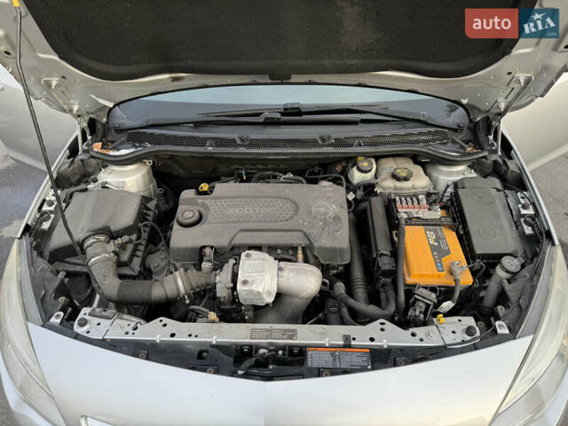 Опель Астра 2011 в Запорожье на Automoto.ua Серый Опель Астра, объемом двигателя 1.25 л и пробегом 289 тыс. км за 5400 $, фото 8 на Automoto.ua