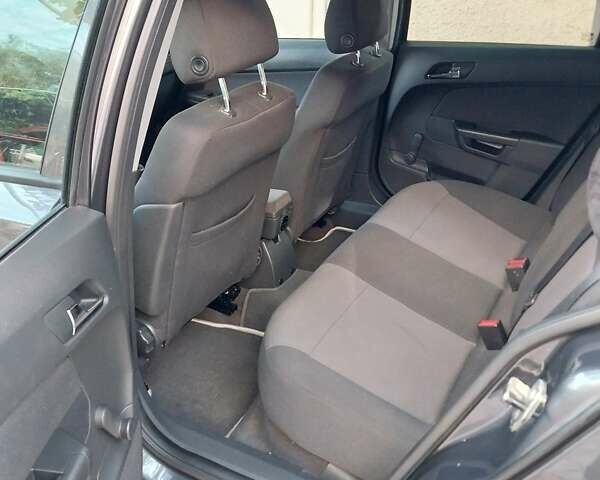 Серый Опель Астра, объемом двигателя 1.6 л и пробегом 147 тыс. км за 7123 $, фото 5 на Automoto.ua