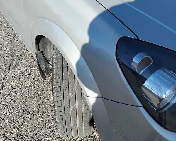 Сірий Опель Астра, об'ємом двигуна 1.4 л та пробігом 205 тис. км за 5600 $, фото 4 на Automoto.ua