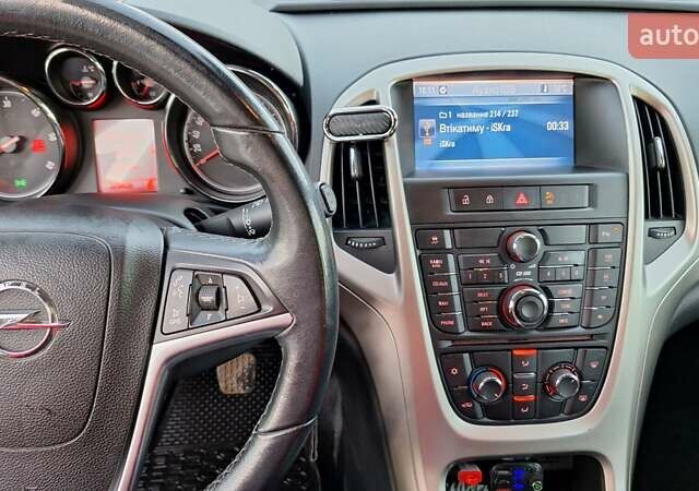 Серый Опель Астра, объемом двигателя 1.3 л и пробегом 329 тыс. км за 5500 $, фото 10 на Automoto.ua