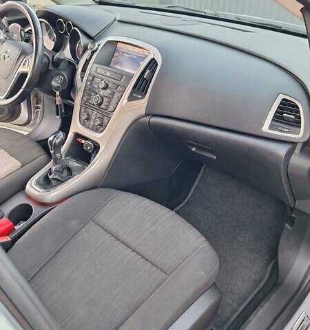 Серый Опель Астра, объемом двигателя 1.3 л и пробегом 329 тыс. км за 5500 $, фото 13 на Automoto.ua