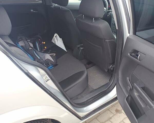 Серый Опель Астра, объемом двигателя 1.6 л и пробегом 99 тыс. км за 5500 $, фото 6 на Automoto.ua