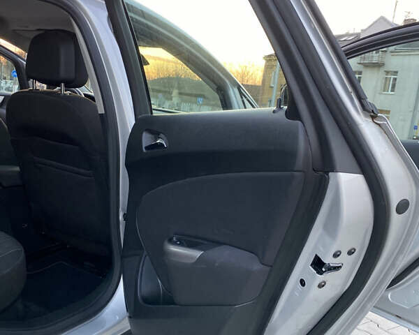 Сірий Опель Астра, об'ємом двигуна 1.6 л та пробігом 128 тис. км за 8299 $, фото 24 на Automoto.ua