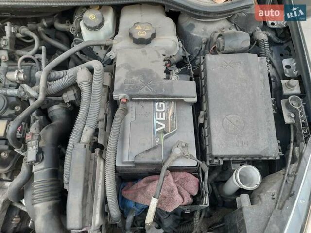 Серый Опель Астра, объемом двигателя 1.36 л и пробегом 197 тыс. км за 6700 $, фото 11 на Automoto.ua