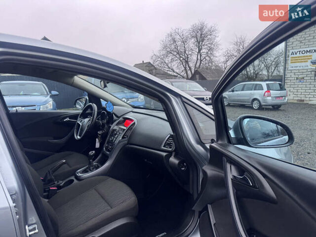 Сірий Опель Астра, об'ємом двигуна 1.4 л та пробігом 230 тис. км за 7390 $, фото 30 на Automoto.ua