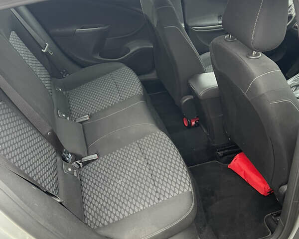 Серый Опель Астра, объемом двигателя 1.4 л и пробегом 160 тыс. км за 10000 $, фото 9 на Automoto.ua