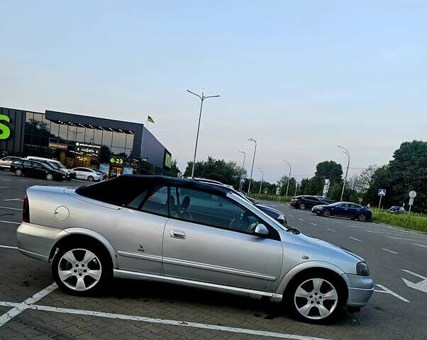 Серый Опель Астра, объемом двигателя 2.2 л и пробегом 212 тыс. км за 3700 $, фото 4 на Automoto.ua