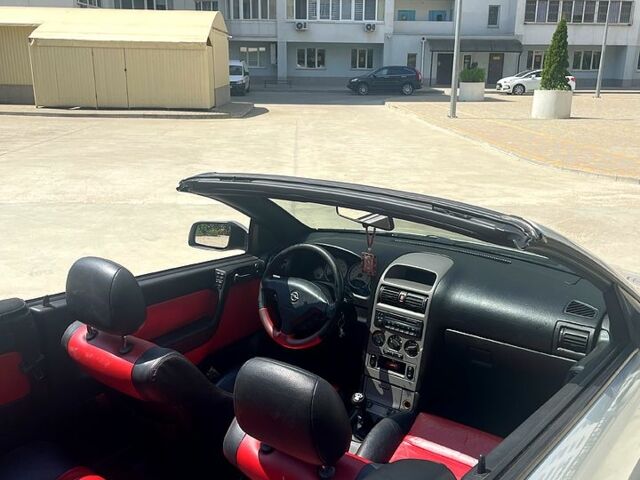 Сірий Опель Астра, об'ємом двигуна 1.8 л та пробігом 180 тис. км за 4500 $, фото 9 на Automoto.ua