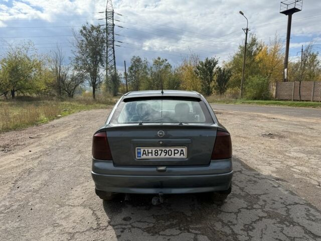 Серый Опель Астра, объемом двигателя 1.6 л и пробегом 333 тыс. км за 1450 $, фото 3 на Automoto.ua