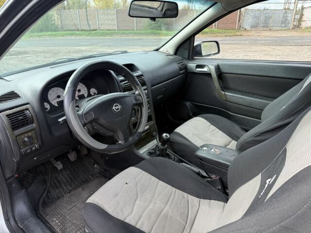 Серый Опель Астра, объемом двигателя 1.6 л и пробегом 333 тыс. км за 1450 $, фото 9 на Automoto.ua