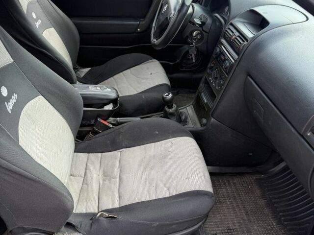 Серый Опель Астра, объемом двигателя 1.6 л и пробегом 333 тыс. км за 1450 $, фото 8 на Automoto.ua