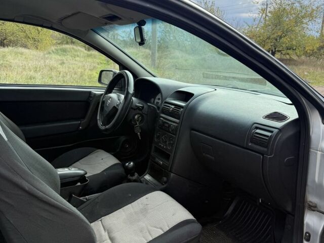 Серый Опель Астра, объемом двигателя 1.6 л и пробегом 333 тыс. км за 1450 $, фото 7 на Automoto.ua