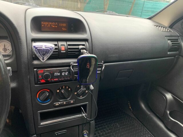 Серый Опель Астра, объемом двигателя 1.8 л и пробегом 220 тыс. км за 2837 $, фото 4 на Automoto.ua