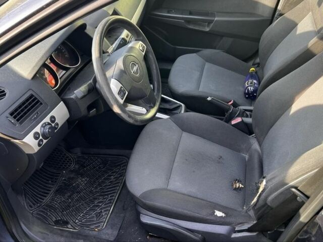 Серый Опель Астра, объемом двигателя 1.6 л и пробегом 220 тыс. км за 4900 $, фото 4 на Automoto.ua