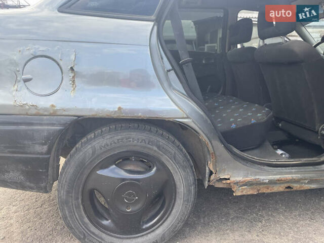 Серый Опель Астра, объемом двигателя 1.8 л и пробегом 558 тыс. км за 1000 $, фото 10 на Automoto.ua