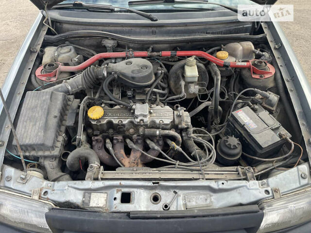 Серый Опель Астра, объемом двигателя 1.8 л и пробегом 558 тыс. км за 1000 $, фото 11 на Automoto.ua