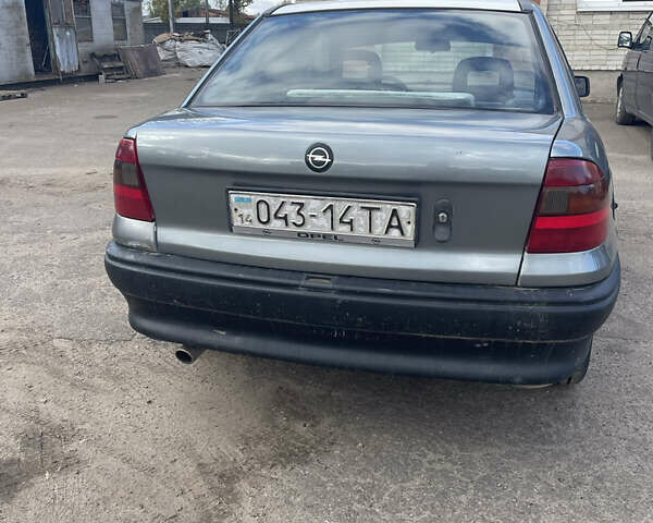 Серый Опель Астра, объемом двигателя 1.8 л и пробегом 558 тыс. км за 1000 $, фото 5 на Automoto.ua