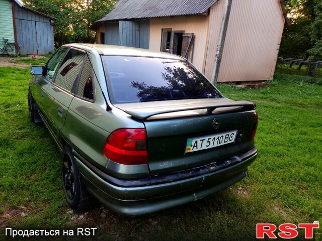 Сірий Опель Астра, об'ємом двигуна 1.4 л та пробігом 396 тис. км за 1300 $, фото 1 на Automoto.ua