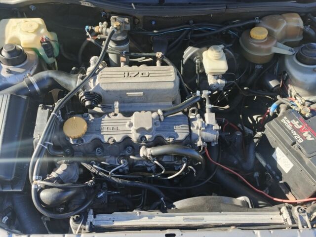 Серый Опель Астра, объемом двигателя 1.7 л и пробегом 320 тыс. км за 1194 $, фото 9 на Automoto.ua