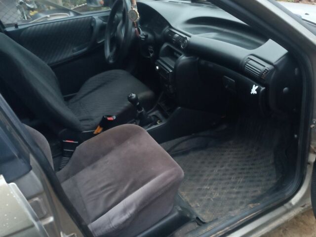 Серый Опель Астра, объемом двигателя 1.4 л и пробегом 280 тыс. км за 850 $, фото 5 на Automoto.ua