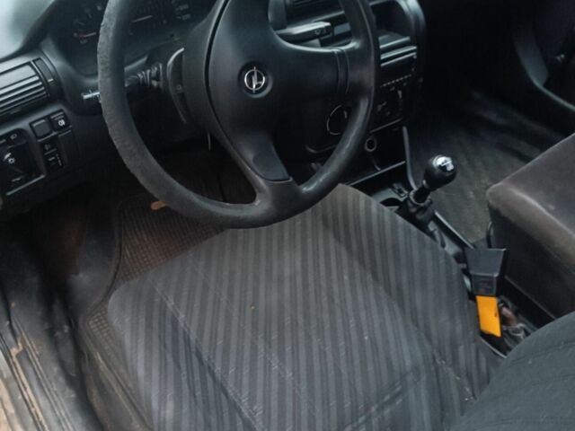 Серый Опель Астра, объемом двигателя 1.4 л и пробегом 280 тыс. км за 850 $, фото 3 на Automoto.ua