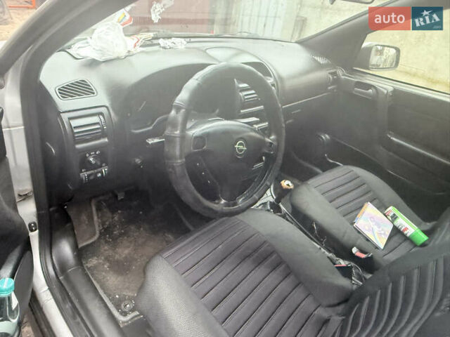 Серый Опель Астра, объемом двигателя 2 л и пробегом 300 тыс. км за 1900 $, фото 5 на Automoto.ua