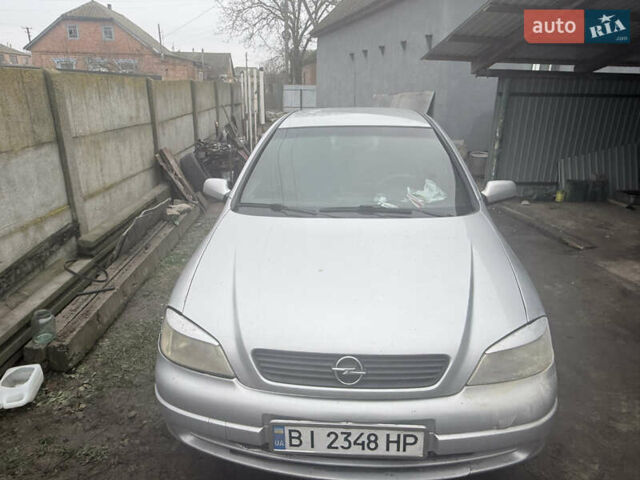 Серый Опель Астра, объемом двигателя 2 л и пробегом 300 тыс. км за 1900 $, фото 3 на Automoto.ua
