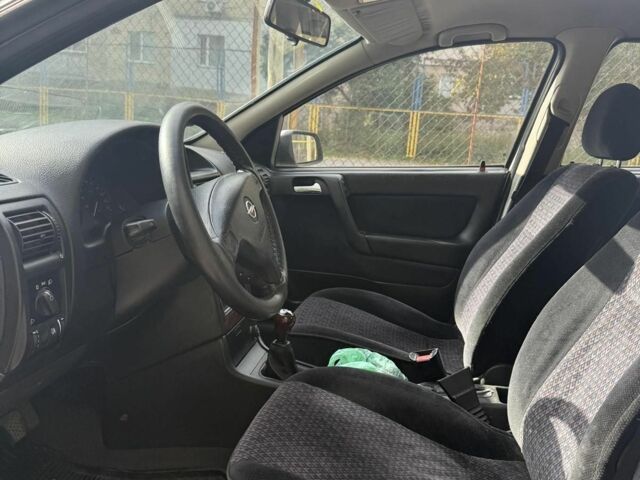 Серый Опель Астра, объемом двигателя 1 л и пробегом 2 тыс. км за 2500 $, фото 3 на Automoto.ua