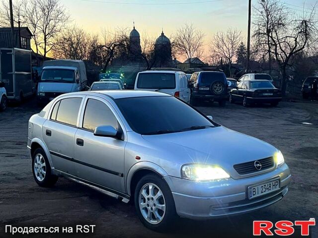 Серый Опель Астра, объемом двигателя 2 л и пробегом 343 тыс. км за 2600 $, фото 4 на Automoto.ua