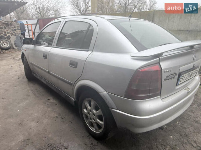 Серый Опель Астра, объемом двигателя 2 л и пробегом 300 тыс. км за 1900 $, фото 1 на Automoto.ua
