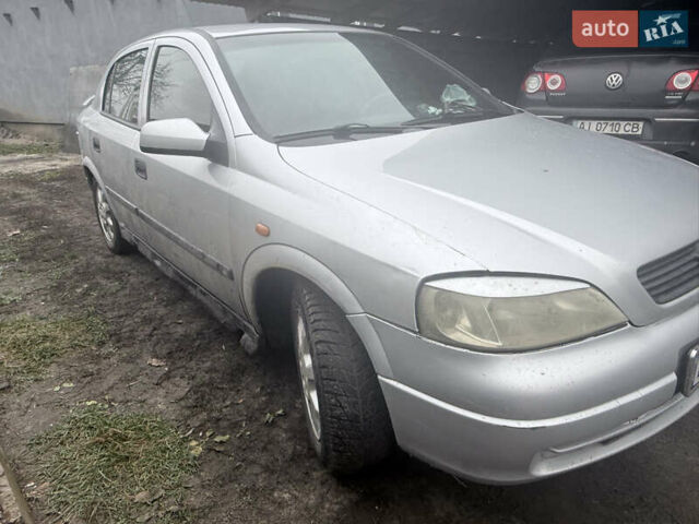 Серый Опель Астра, объемом двигателя 2 л и пробегом 300 тыс. км за 1900 $, фото 2 на Automoto.ua