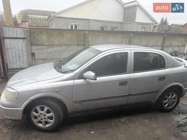 Серый Опель Астра, объемом двигателя 2 л и пробегом 300 тыс. км за 1900 $, фото 4 на Automoto.ua