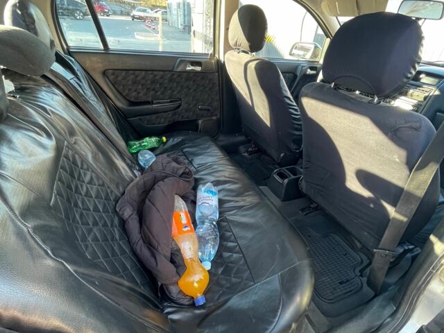 Серый Опель Астра, объемом двигателя 1.7 л и пробегом 486 тыс. км за 1700 $, фото 5 на Automoto.ua