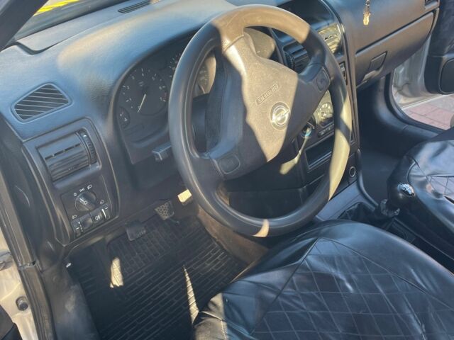 Серый Опель Астра, объемом двигателя 1.7 л и пробегом 486 тыс. км за 1700 $, фото 4 на Automoto.ua