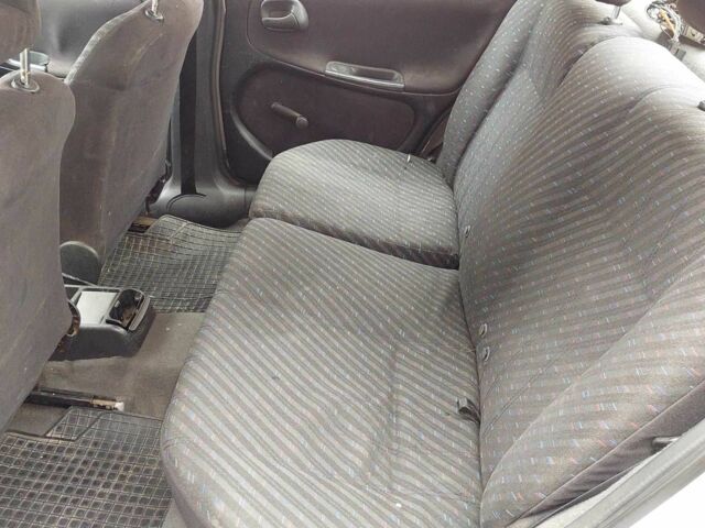 Серый Опель Астра, объемом двигателя 1.6 л и пробегом 230 тыс. км за 1650 $, фото 2 на Automoto.ua