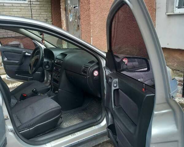 Серый Опель Астра, объемом двигателя 1.6 л и пробегом 220 тыс. км за 3000 $, фото 6 на Automoto.ua