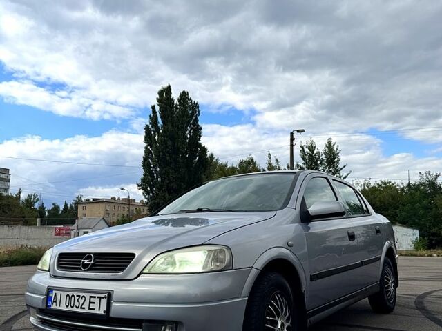 Серый Опель Астра, объемом двигателя 1.4 л и пробегом 200 тыс. км за 2399 $, фото 1 на Automoto.ua