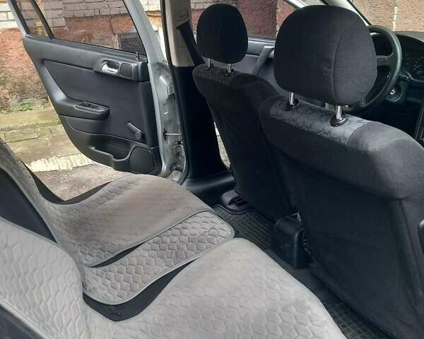 Серый Опель Астра, объемом двигателя 1.6 л и пробегом 220 тыс. км за 3000 $, фото 5 на Automoto.ua