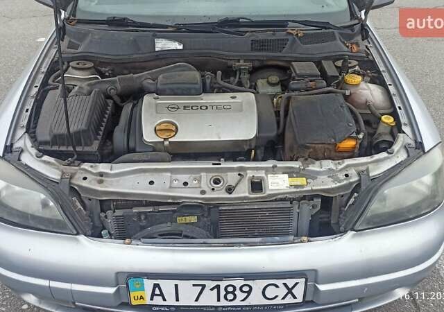 Серый Опель Астра, объемом двигателя 1.6 л и пробегом 235 тыс. км за 2500 $, фото 4 на Automoto.ua