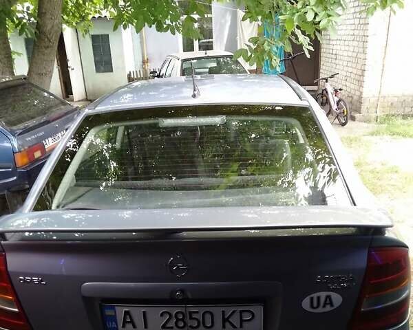 Сірий Опель Астра, об'ємом двигуна 1.4 л та пробігом 164 тис. км за 3100 $, фото 6 на Automoto.ua