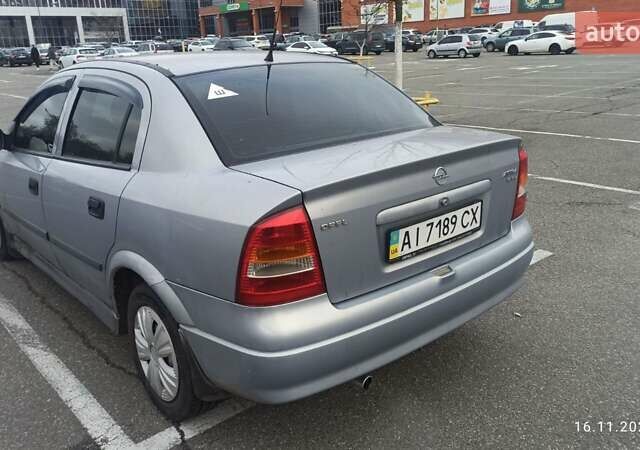Серый Опель Астра, объемом двигателя 1.6 л и пробегом 235 тыс. км за 2500 $, фото 10 на Automoto.ua