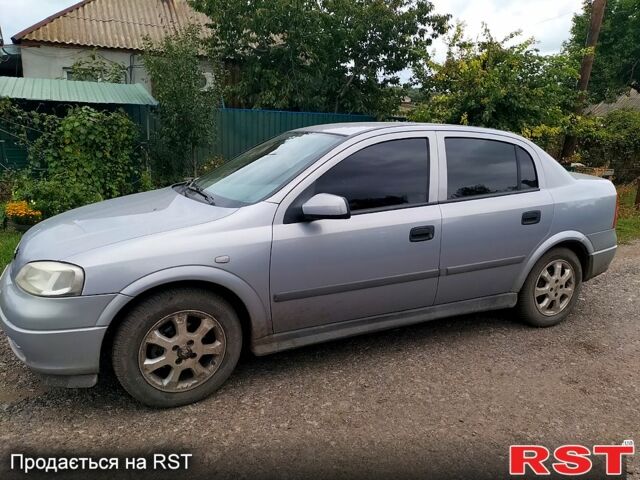 Серый Опель Астра, объемом двигателя 1.4 л и пробегом 174 тыс. км за 3000 $, фото 1 на Automoto.ua