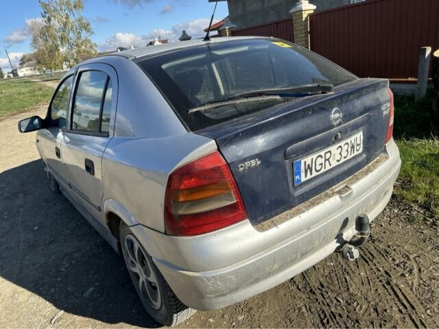 Серый Опель Астра, объемом двигателя 2 л и пробегом 196 тыс. км за 1109 $, фото 2 на Automoto.ua