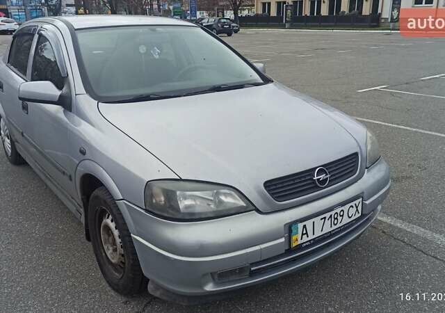 Серый Опель Астра, объемом двигателя 1.6 л и пробегом 235 тыс. км за 2500 $, фото 1 на Automoto.ua