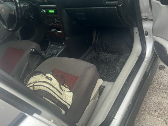 Серый Опель Астра, объемом двигателя 2 л и пробегом 292 тыс. км за 3000 $, фото 12 на Automoto.ua