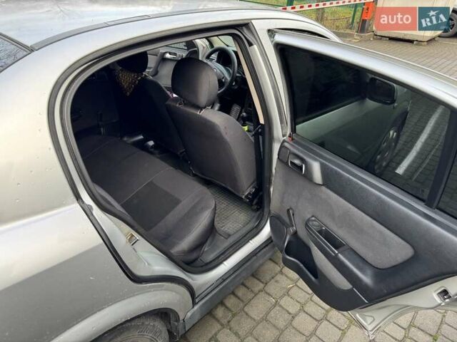 Серый Опель Астра, объемом двигателя 1.6 л и пробегом 420 тыс. км за 3500 $, фото 5 на Automoto.ua